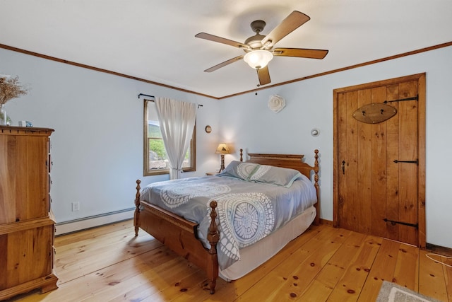 126 Stoddard Rd, Columbia, NH 03576 - bedroom featuring a baseboard heating unit, ornamental molding, light wood finished floors, a ceiling fan, and baseboards