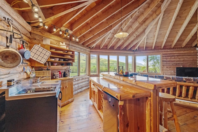 126 Stoddard Rd, Columbia, NH 03576 - kitchen featuring a sink, light wood-style flooring, healthy amount of natural light, wooden ceiling, and rustic walls