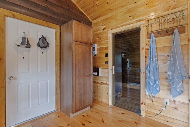 126 Stoddard Rd, Columbia, NH 03576 - bathroom featuring vaulted ceiling, wooden walls, wooden ceiling, and hardwood / wood-style flooring