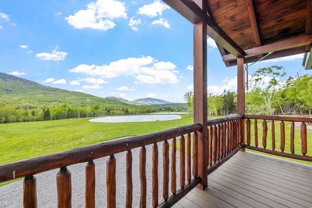 126 Stoddard Rd, Columbia, NH 03576 - deck featuring a water and mountain view and a yard