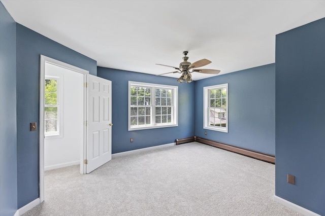53 Crestview Dr, Jaffrey, NH 03452 - empty room featuring ceiling fan, carpet floors, a baseboard radiator, and baseboards