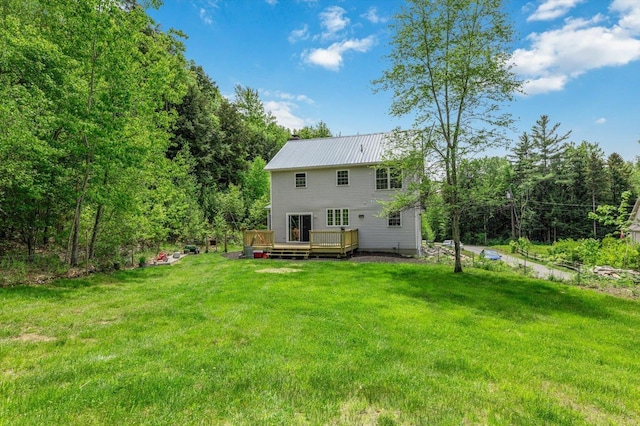 53 Crestview Dr, Jaffrey, NH 03452 - back of property with a lawn, a wooden deck, and metal roof