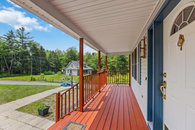 53 Crestview Dr, Jaffrey, NH 03452 - wooden porch featuring view of scattered trees and a yard