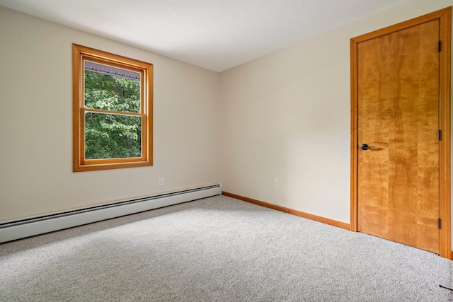 40 Trolley St, Manchester, NH 03103 - empty room featuring carpet, a baseboard radiator, and baseboards