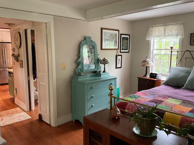 2 Mack Hill Rd, Amherst, NH 03031 - bedroom featuring stainless steel fridge, light wood-style floors, and baseboards
