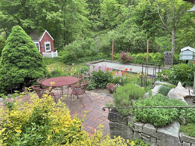 2 Mack Hill Rd, Amherst, NH 03031 - view of patio / terrace featuring a view of trees and outdoor dining space