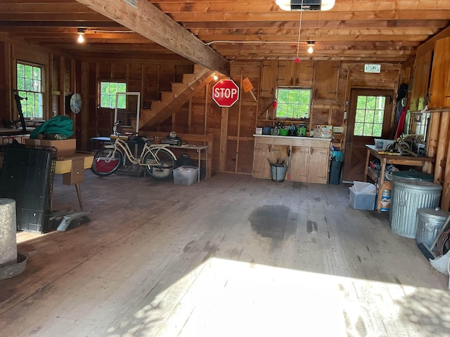 2 Mack Hill Rd, Amherst, NH 03031 - garage featuring wood walls and a workshop area