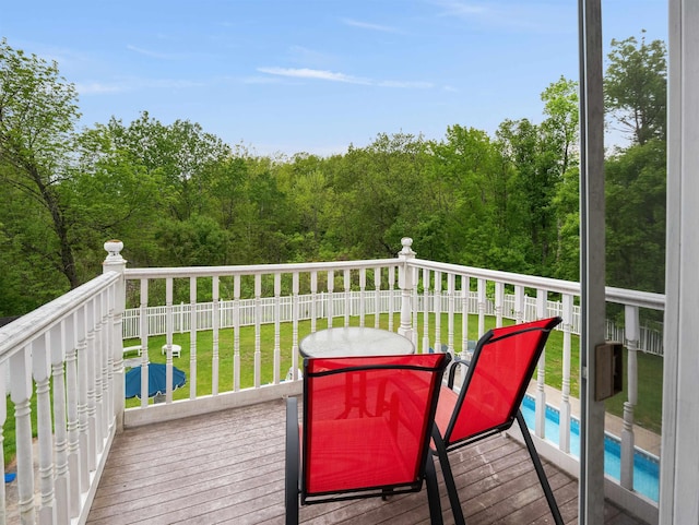 1851 York Street Ext, Poultney, VT 05764 - wooden deck with a lawn, an outdoor pool, and a wooded view