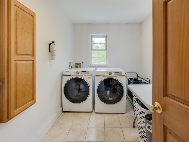 1851 York Street Ext, Poultney, VT 05764 - laundry room with washing machine and clothes dryer, light tile patterned floors, and baseboards