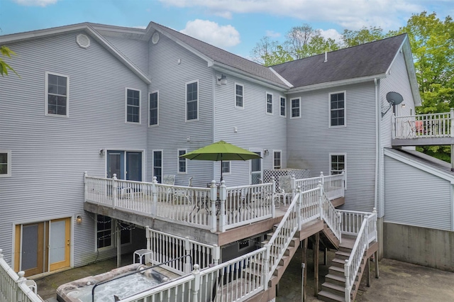 1851 York Street Ext, Poultney, VT 05764 - rear view of house featuring stairway, a deck, and roof with shingles
