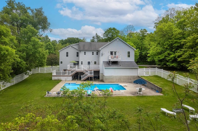 1851 York Street Ext, Poultney, VT 05764 - rear view of house with a wooden deck, a patio, and a shingled roof