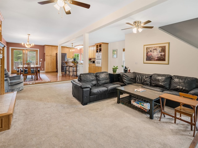 1851 York Street Ext, Poultney, VT 05764 - living area featuring a chandelier, a ceiling fan, and light carpet