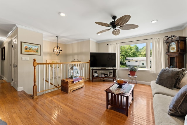 165 Tanglewood Dr, Colchester, VT 05546 - living room featuring light wood-style floors, baseboards, ornamental molding, ceiling fan, and recessed lighting