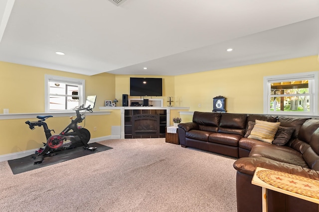 165 Tanglewood Dr, Colchester, VT 05546 - living room with carpet flooring, a tile fireplace, recessed lighting, and baseboards