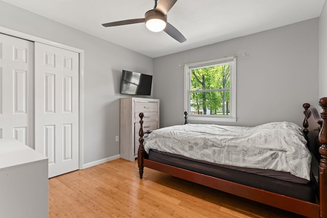 165 Tanglewood Dr, Colchester, VT 05546 - bedroom featuring light wood-style floors, a ceiling fan, a closet, and baseboards