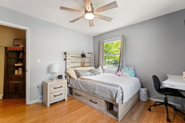 165 Tanglewood Dr, Colchester, VT 05546 - bedroom featuring light wood-style floors, baseboards, ceiling fan, and an office area