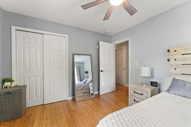 165 Tanglewood Dr, Colchester, VT 05546 - bedroom featuring a closet, light wood-style flooring, and a ceiling fan
