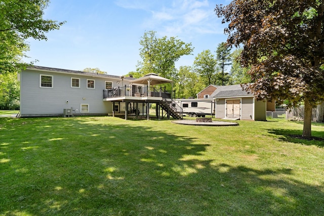 165 Tanglewood Dr, Colchester, VT 05546 - rear view of property with a deck, stairs, and an outbuilding
