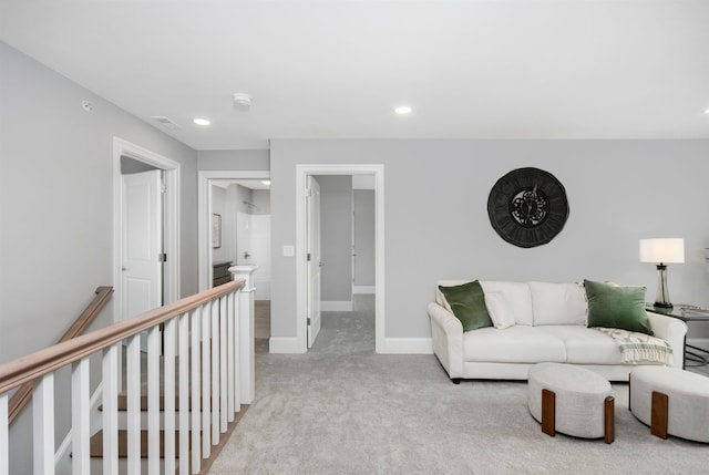 148 County Rd, Amherst, NH 03055 - living area with light colored carpet, recessed lighting, and baseboards