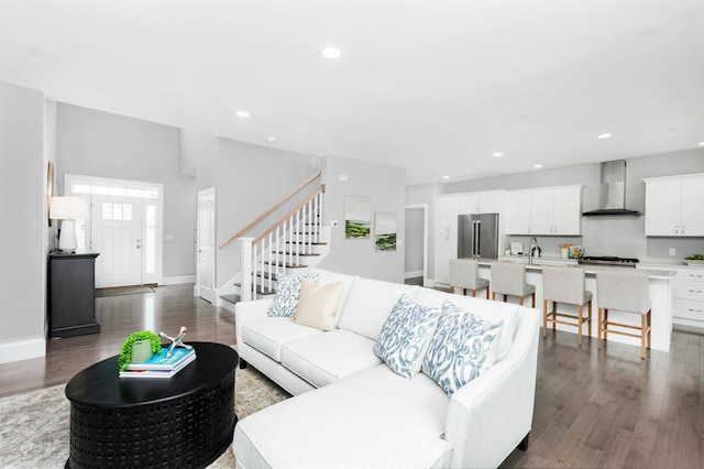 148 County Rd, Amherst, NH 03055 - living area with dark wood finished floors, stairs, recessed lighting, and baseboards