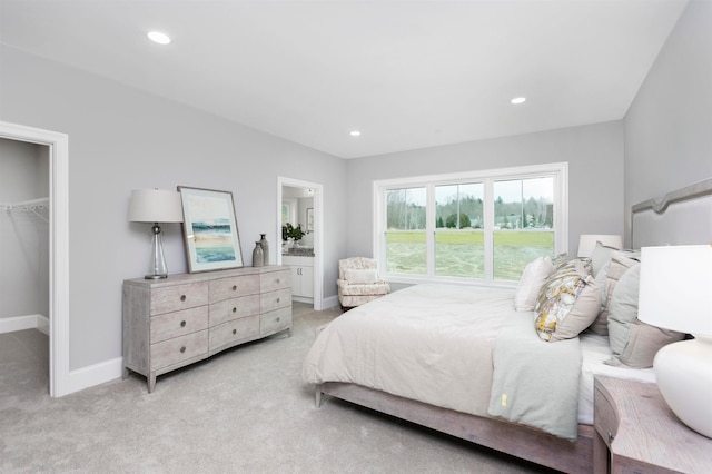 148 County Rd, Amherst, NH 03055 - bedroom with a spacious closet, light colored carpet, baseboards, a closet, and recessed lighting