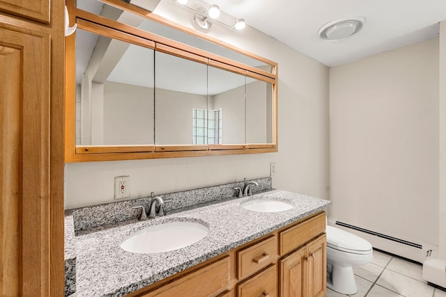28 Olde Lantern Rd, Bedford, NH 03110 - full bathroom with baseboard heating, toilet, double vanity, tile patterned floors, and a baseboard radiator