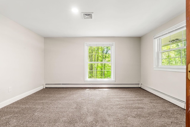 28 Olde Lantern Rd, Bedford, NH 03110 - carpeted spare room with healthy amount of natural light, a baseboard radiator, baseboards, and baseboard heating