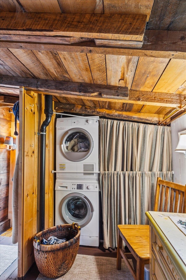 138 Miller Dr, Nelson, NH 03457 - washroom with wood ceiling, stacked washer / drying machine, and wood walls