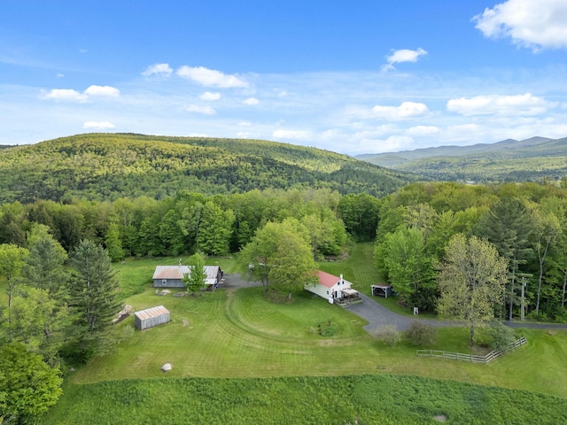 122 Wallace Rd, Northfield, VT 05663 - aerial view of property and surrounding area featuring a heavily wooded area and mountains