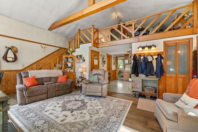 122 Wallace Rd, Northfield, VT 05663 - living room featuring wooden walls, wood finished floors, and stairway