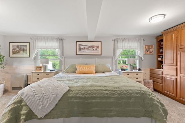 122 Wallace Rd, Northfield, VT 05663 - bedroom with light carpet, multiple windows, and beam ceiling