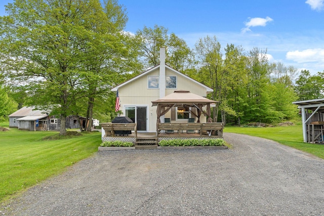 122 Wallace Rd, Northfield, VT 05663 - view of front of house with a gazebo, a front yard, a wooden deck, and driveway