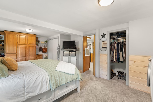 122 Wallace Rd, Northfield, VT 05663 - bedroom with light carpet, a spacious closet, and washer / clothes dryer