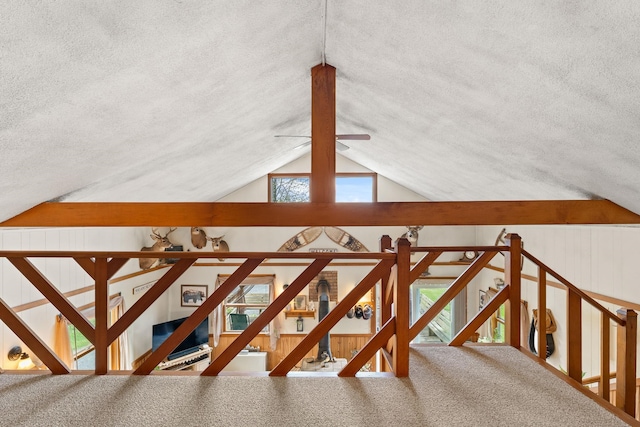 122 Wallace Rd, Northfield, VT 05663 - corridor with a textured ceiling, an upstairs landing, vaulted ceiling, and carpet floors