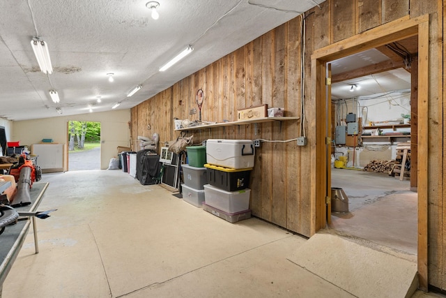 122 Wallace Rd, Northfield, VT 05663 - garage featuring wooden walls and a workshop area