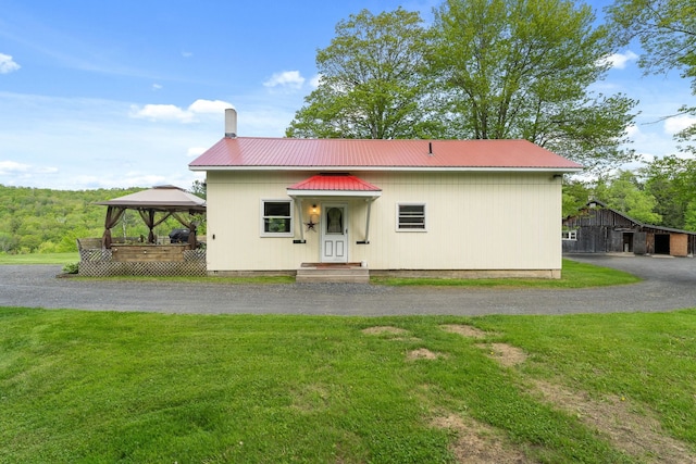 122 Wallace Rd, Northfield, VT 05663 - view of front of property with a gazebo, a front yard, and metal roof