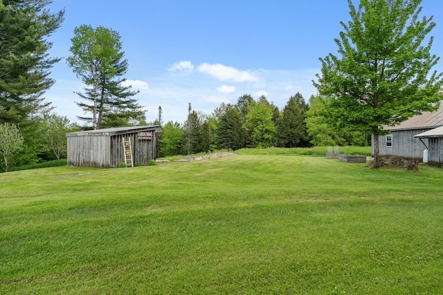 122 Wallace Rd, Northfield, VT 05663 - view of grassy yard with an outdoor structure