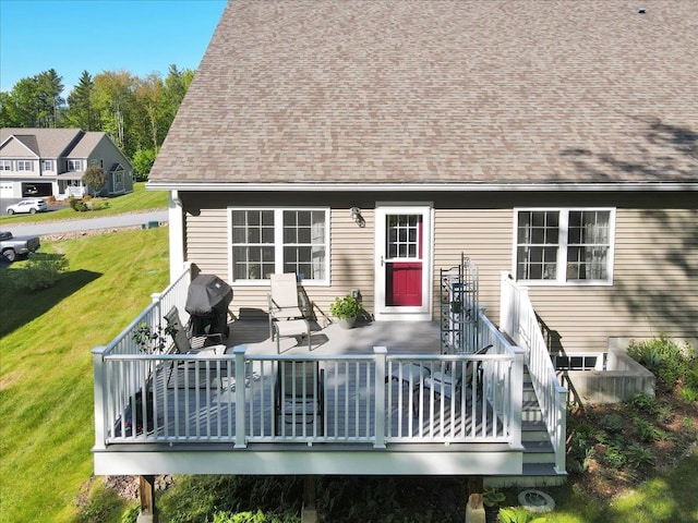 28A Black Walnut Ln Unit A, Jericho, VT 05465 - back of property with a lawn and a deck