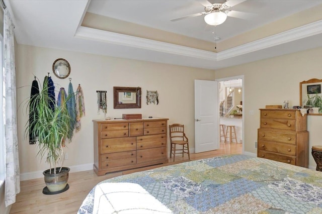 28A Black Walnut Ln Unit A, Jericho, VT 05465 - bedroom featuring wood finished floors, baseboards, a raised ceiling, and ceiling fan