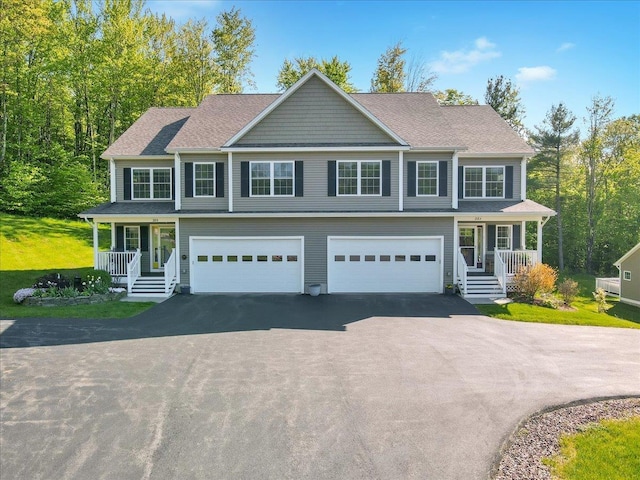 28A Black Walnut Ln Unit A, Jericho, VT 05465 - view of front facade with covered porch, asphalt driveway, an attached garage, and a shingled roof