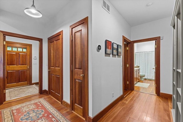 1444 Upper Hollow Rd, Stowe, VT 05672 - foyer entrance featuring light wood-type flooring and baseboards