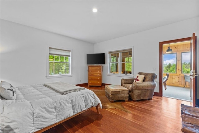 1444 Upper Hollow Rd, Stowe, VT 05672 - bedroom with multiple windows and wood finished floors