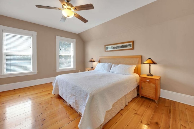 162 Sagamore St, Manchester, NH 03104 - bedroom with baseboards, light wood-style flooring, ceiling fan, and vaulted ceiling