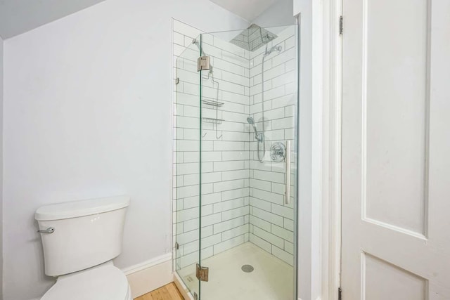162 Sagamore St, Manchester, NH 03104 - bathroom featuring toilet, a shower stall, and baseboards