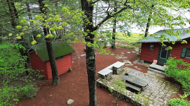 241 Skatutakee Rd, Harrisville, NH 03450 - view of yard with a patio area, entry steps, and an outdoor structure