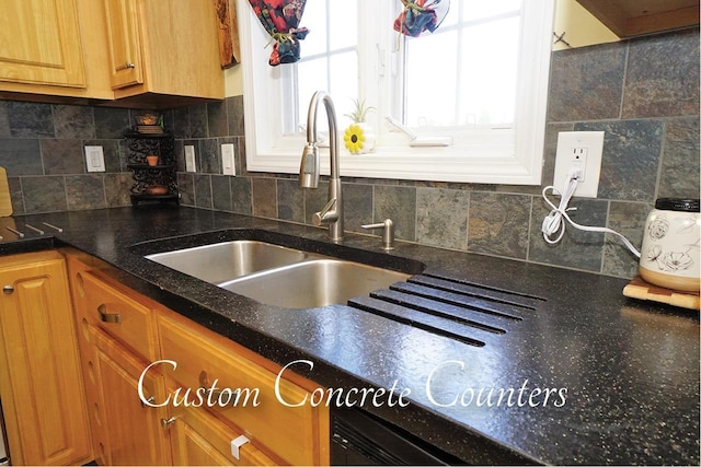 602 Silver St Unit 5, Manchester, NH 03103 - kitchen with tasteful backsplash, dark stone counters, and brown cabinets
