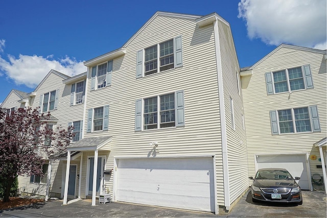 602 Silver St Unit 5, Manchester, NH 03103 - multi unit property featuring an attached garage and asphalt driveway
