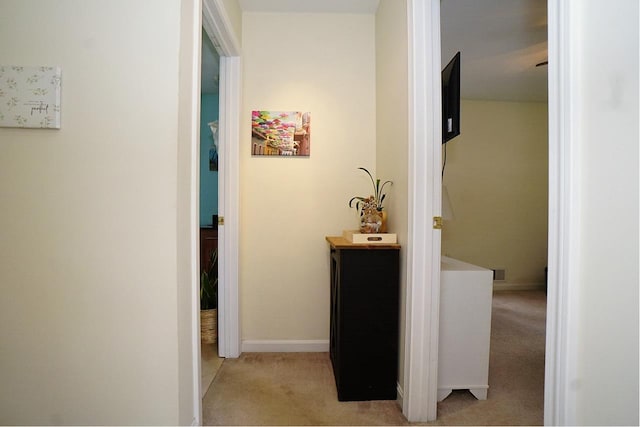 602 Silver St Unit 5, Manchester, NH 03103 - hallway with light carpet and baseboards