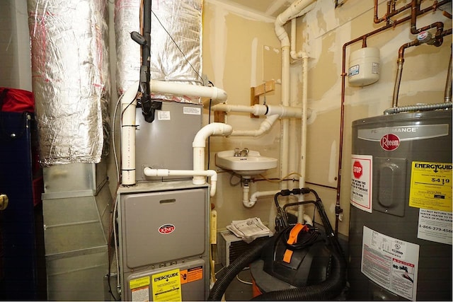 602 Silver St Unit 5, Manchester, NH 03103 - utility room featuring water heater