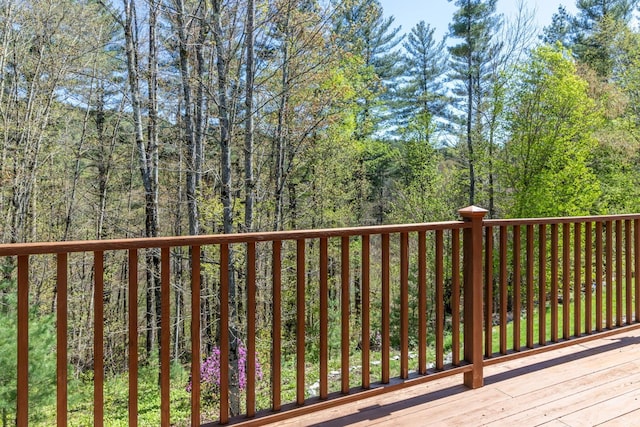 456 Thomas Ln, Stowe, VT 05672 - wooden deck featuring a wooded view